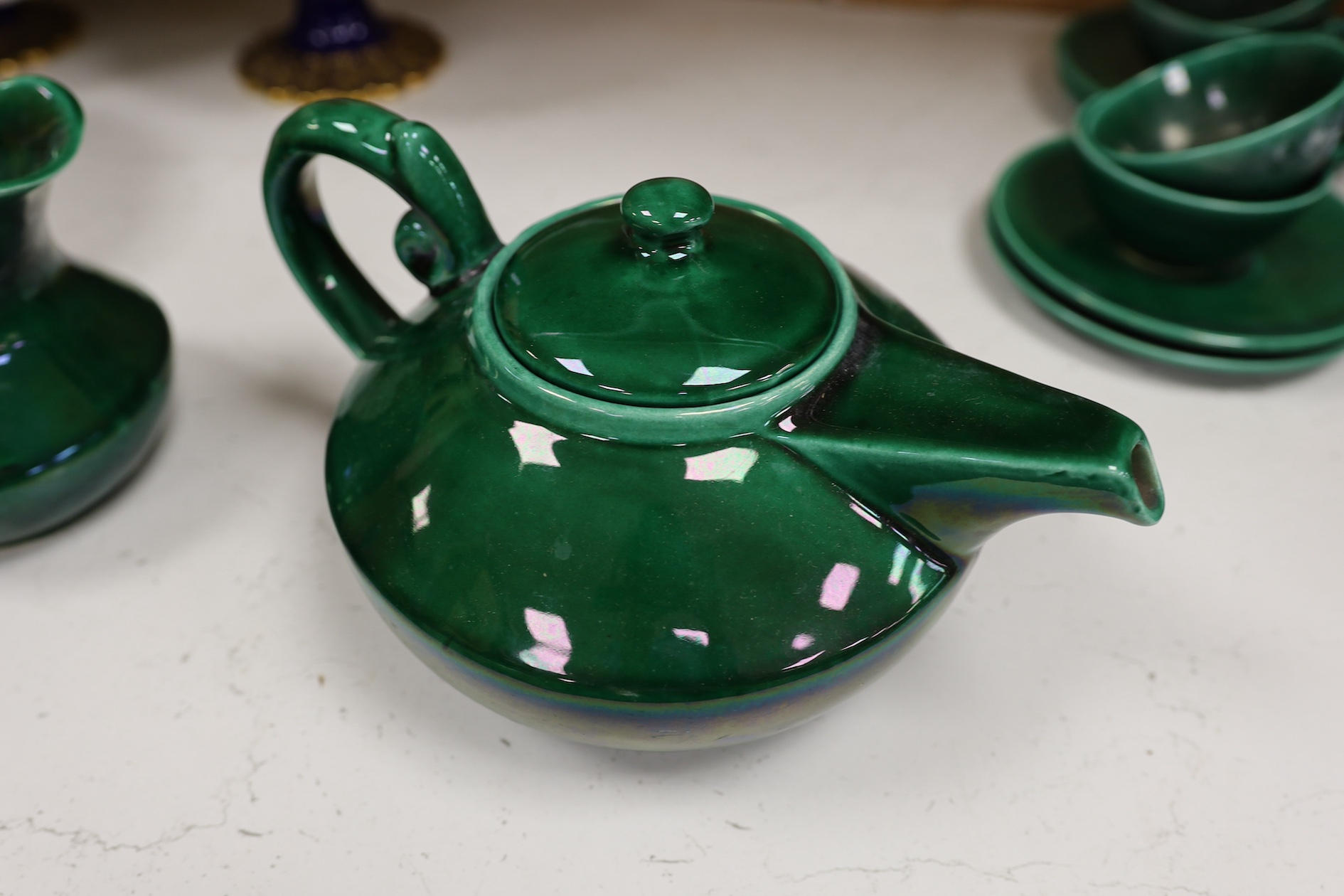 A Vallauris French bright green tea service, with six cups saucers milk jug and tea pot, jug 12.5cm high. Condition - fair to good